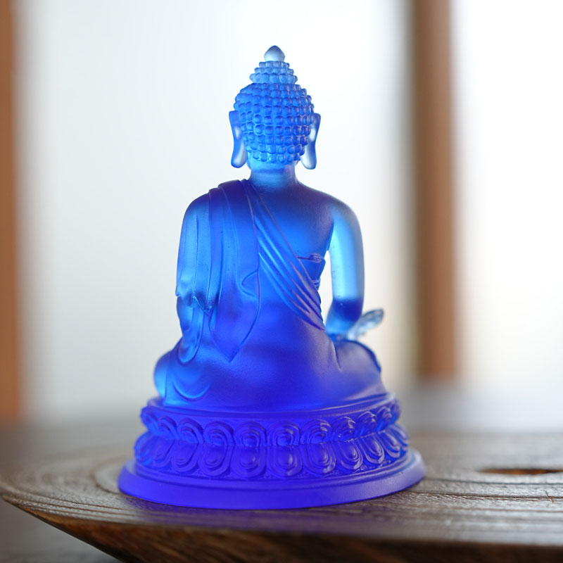 لعاب رنگی مجسمه های بودا پزشکی